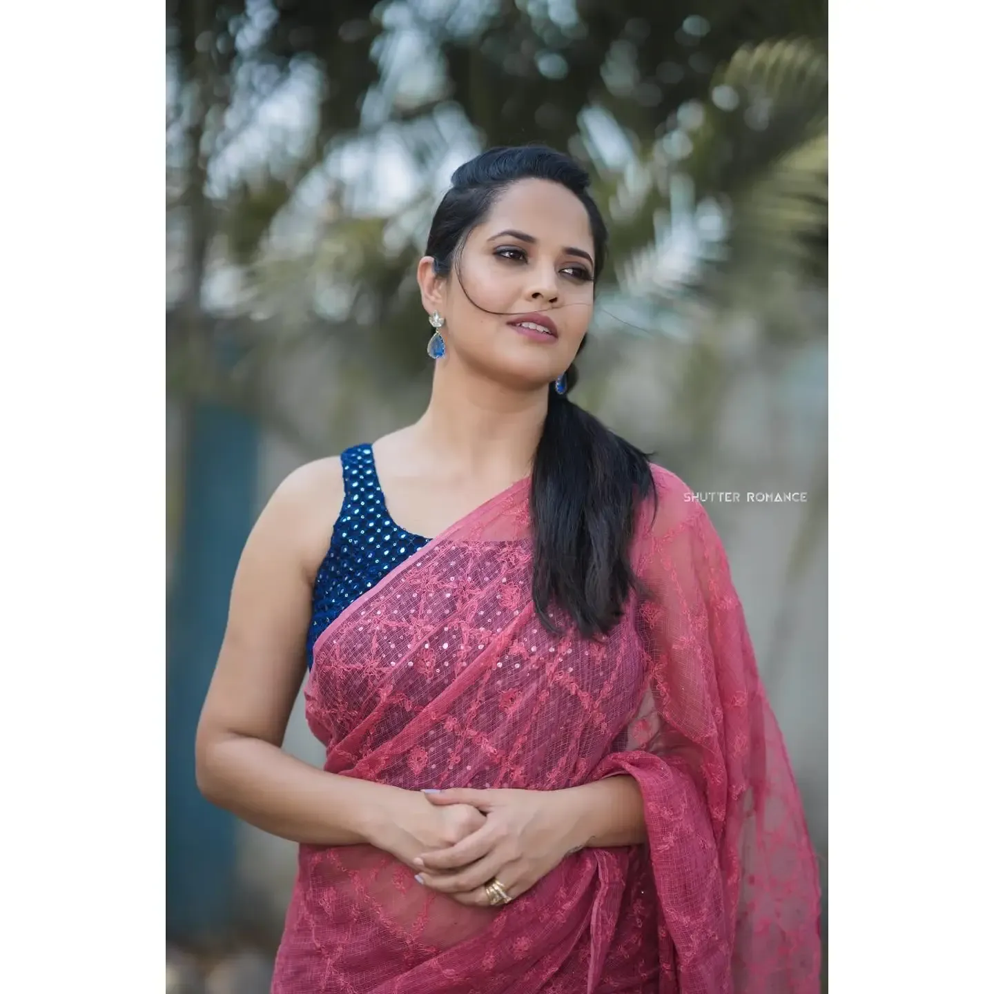 TV ANCHOR ANASUYA BHARADWAJ IMAGES IN SLEEVELESS RED SAREE 7